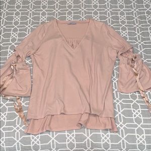 1.State cutout bell sleeve sweater